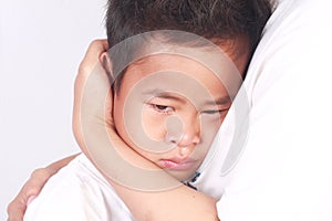 Sad Asian Boy, Crying in His Mothers Arm