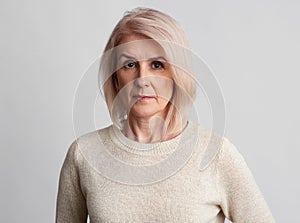 Sad beautiful aged woman
