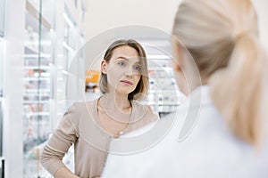 Sad beautiful woman desiring medication