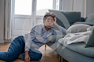 Sad black woman suffering from depression symptoms feeling distressed alone at home