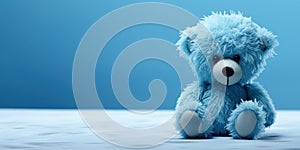 sad blue teddy bear, on a blue background, blue monday, copy space, banner