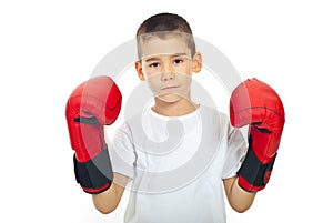 Sad boy with boxing gloves