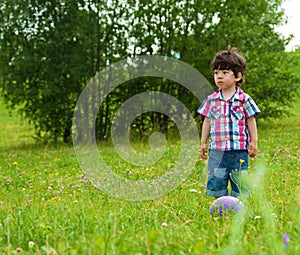 Sad boy waiting friend to play