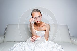 Sad bride crying photo