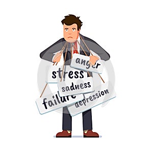 Sad business man overburdened by stress, failure