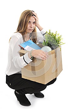 Sad Business Woman carrying Cardboard Box fired from Job