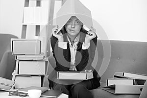 Sad busy secretary with many folders of documents, stressed overworked business woman too much work, office problem