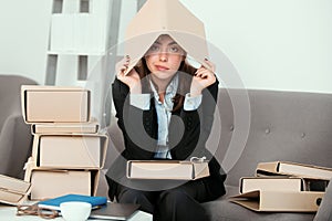 Sad busy secretary with many folders of documents, stressed overworked business woman too much work, office problem