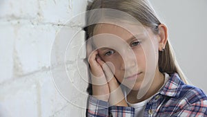 Sad Child, Unhappy Kid, Sick Ill Girl in Depression, Stressed Thoughtful Person
