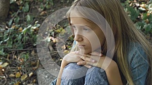 Sad Child, Unhappy Kid, Thoughtful Bullied Teenager Girl Outdoor in Park, Children Sadness, Depression Portrait of Adolescents