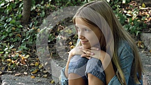 Sad Child, Unhappy Kid, Thoughtful Bullied Teenager Girl Outdoor in Park, Children Sadness, Depression Portrait of Adolescents