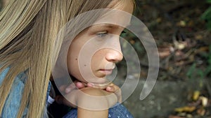 Sad Child, Unhappy Kid, Thoughtful Bullied Teenager Girl Outdoor in Park, Children Sadness, Depression Portrait of Adolescents
