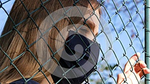 Sad Child Wears Protective Mask due Coronavirus Pandemic, Sick Unhappy Girl, Depressed Kid not Playing with Children,  Depression