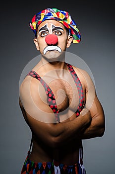 Sad clown against