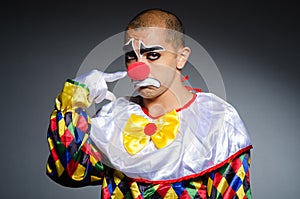 Sad clown against