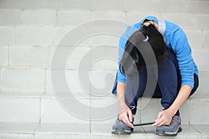 Sad college student use smart phone