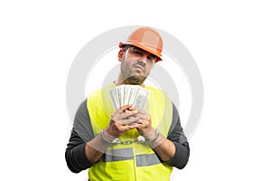 Sad corrupted constructor arrested showing stolen money