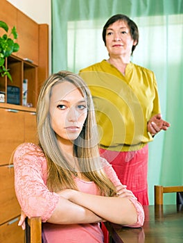 Sad daughter after a quarrel with mother