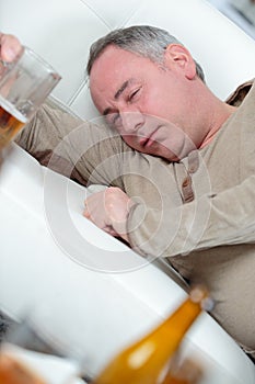 Sad depressed alcoholic businessman