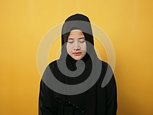 Sad depressed anxiety Asian muslim woman thinking contemplating bad thing happened in her life, stress exhausted feeling down