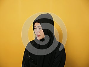 Sad depressed anxiety Asian muslim woman thinking contemplating bad thing happened in her life, stress exhausted feeling down