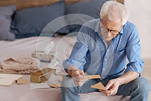 Sad depressed man holding a note