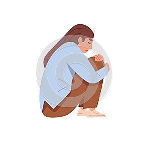 Sad depressed person in grief and despair. Unhappy upset woman in depression and frustration, sitting and hugging knees