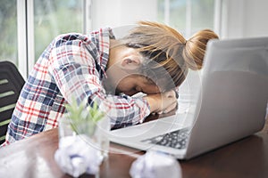 Sad and depressed woman in the deep thought in the office. stress, failure at work