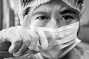 Sad desperate asian woman crying and tears eyes,stressed female doctor or nurse in medical uniform,grieving,eyes full of tears