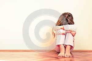 Sad and disappointed little girl. Emotion problems. Copy space