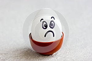 Sad egg with painted face