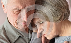 Sad elder couple