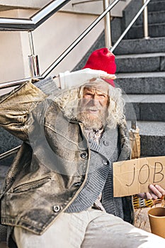 Sad elderly man being jobless