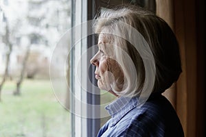 Sad elderly woman