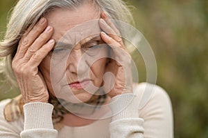 Sad elderly woman close-up