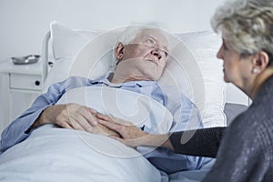 Sad elders at hospital