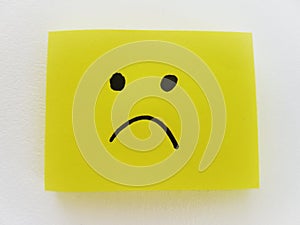 Sad expression. Simple yellow note