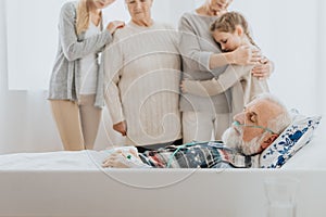 Sad family and dying man