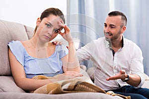 Sad female is depressing and husband is supporting her