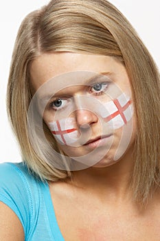 Sad Female Sports Fan With St Georges Flag On Face