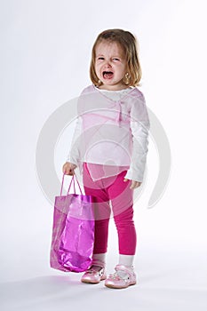 Sad girl with shopping bag