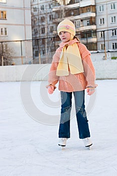 Sad girl on a skating rink