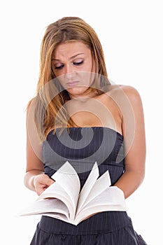 Sad girl student holding a open book