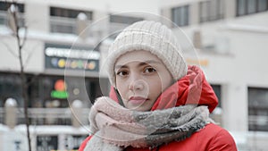 Sad girl student portrait in warm clothes in spring autumn or winter