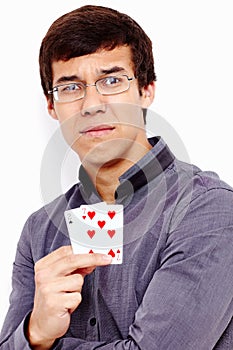 Sad guy with bad playing cards