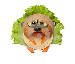 Sad hamster made of bread and vegetables on isolated background