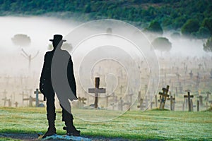 Sad Hill Cemetery with cowboy silhouette, Spain