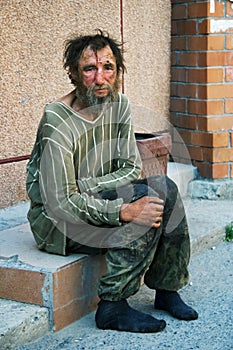 Sad homeless man