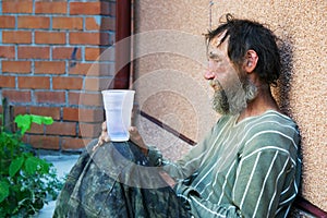 Sad homeless man