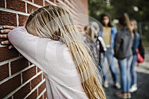 Sad intimidation moment Elementary Age Bullying in Schoolyard